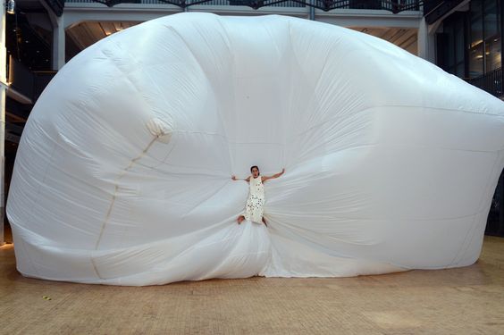 a dancer performs at an exhibit in Germany
